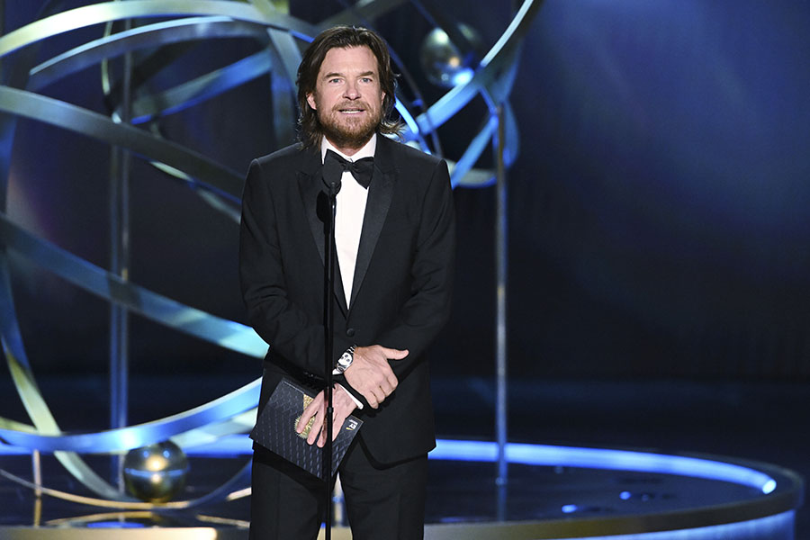 Jason Bateman from Ozark presents an award onstage at the 75th Emmy